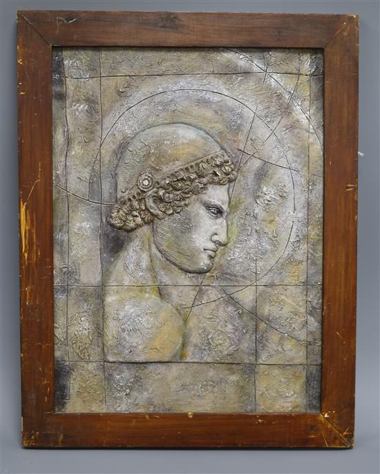 A framed relief panel 39 x 29cm